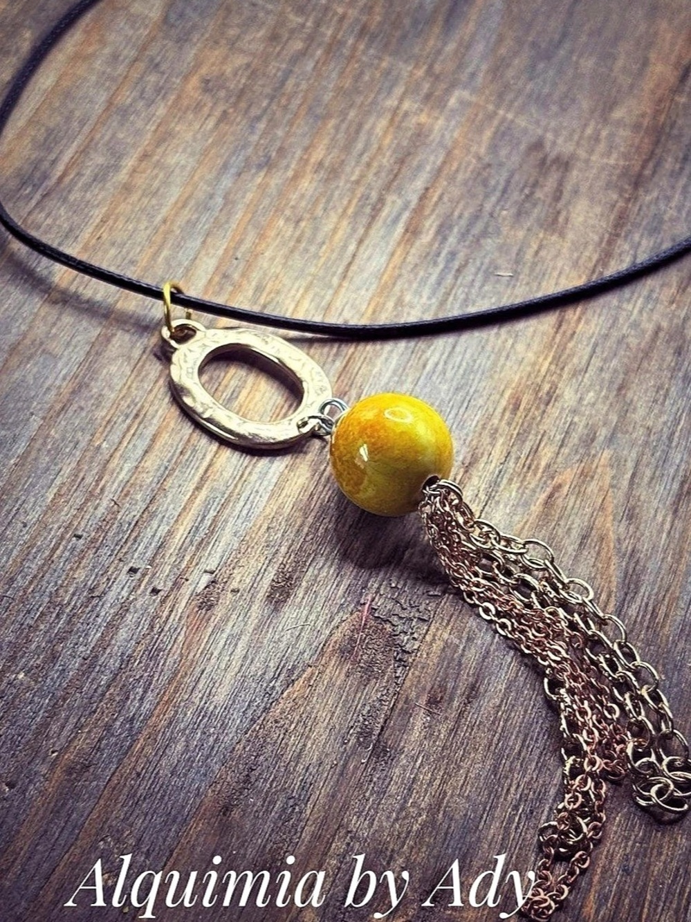 SCULPTURAL + TASSELS Pendant Necklace in black & Yellow